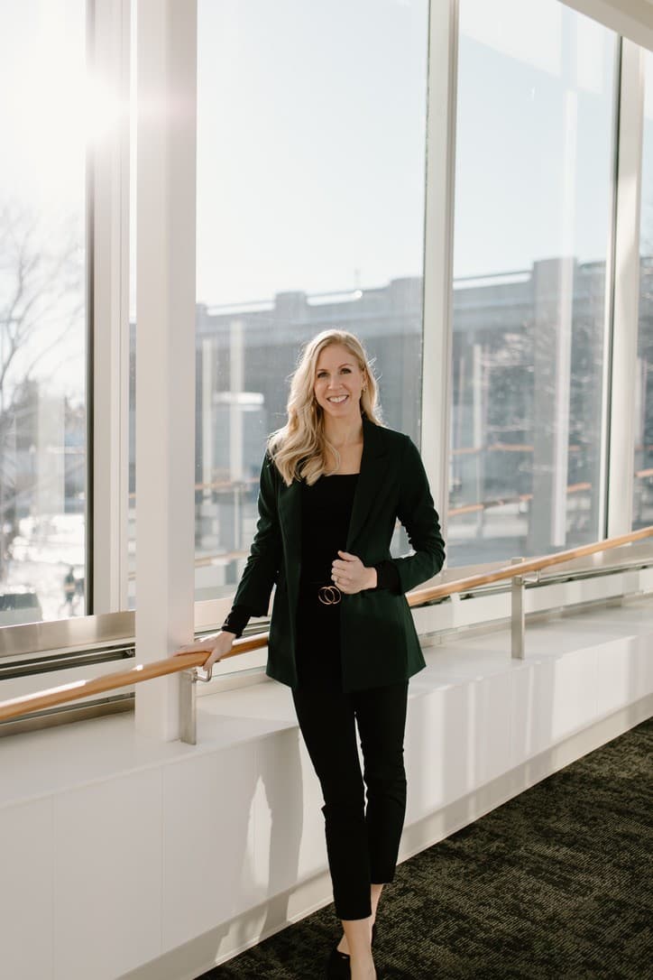 Chelsie Kuhn in a sunlit office